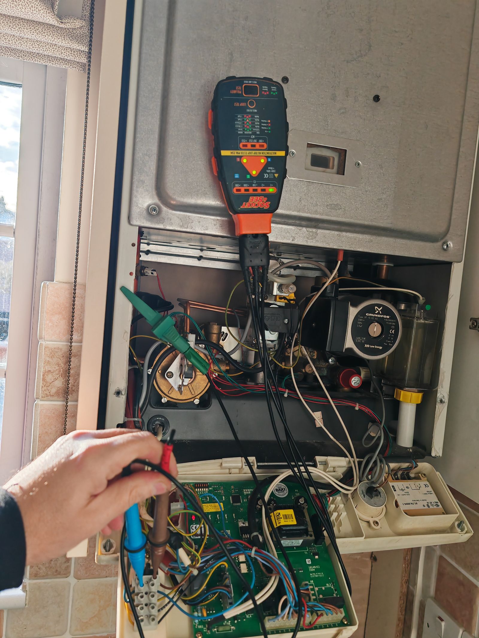 Prices boiler repairs call-out in Hertford — Grant's Plumbing and Heating engineer on site